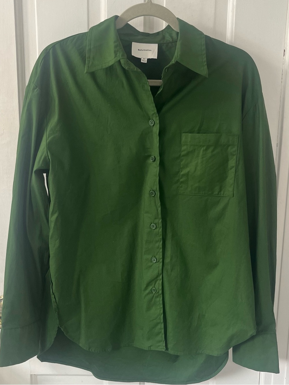 Reformation Women’s Will Oversized Shirt in a vibrant green shade. Minimalist